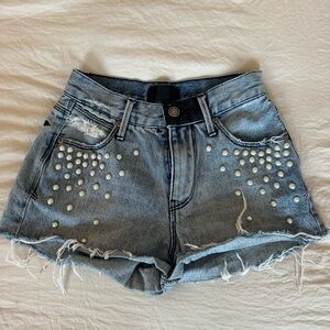 RtA Blue Jean Shorts with Embellished Design